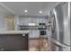 Bright kitchen featuring stainless steel appliances, a stylish backsplash, and butcher block island at 9034 Caminito Ct, Indianapolis, IN 46234