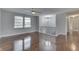 Bright living room featuring hardwood floors and a ceiling fan at 9034 Caminito Ct, Indianapolis, IN 46234