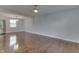 Cozy living area with hardwood floors and ceiling fan at 9034 Caminito Ct, Indianapolis, IN 46234