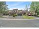 Charming townhome with attached garage, lovely landscaping, and inviting curb appeal in a desirable neighborhood at 9658 Highgate N Cir, Indianapolis, IN 46250
