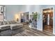 Spacious living room with stylish decor, open layout, and seamless access to the kitchen and dining areas at 9658 Highgate N Cir, Indianapolis, IN 46250