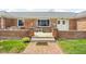 Charming front porch with double doors and brick walkway at 10239 Wilson Rd, Brownsburg, IN 46112