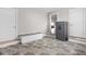 Mud room with storage bench, tile flooring, and access to the home, showing the safe at 10239 Wilson Rd, Brownsburg, IN 46112