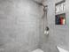 Contemporary shower with gray tiling and recessed niche at 10239 Wilson Rd, Brownsburg, IN 46112