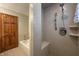 Modern bathroom with a glass-enclosed shower and a separate bathtub with tiled surround at 10586 W School Pkwy, Carmel, IN 46280