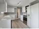 Spacious kitchen featuring modern appliances and ample countertop space at 10586 W School Pkwy, Carmel, IN 46280
