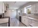 Modern kitchen with stainless steel appliances and plenty of counter space at 10586 W School Pkwy, Carmel, IN 46280