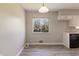 Cozy kitchen area featuring modern vinyl floors and ample natural light at 10586 W School Pkwy, Carmel, IN 46280