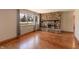 Inviting living room with hardwood floors and a striking stone fireplace at 10586 W School Pkwy, Carmel, IN 46280