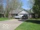 Charming one-story home with attached garage and inviting front yard at 1080 W Wildflower Ct, Mooresville, IN 46158