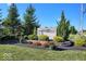The Villages at Timber Run sign is surrounded by manicured landscaping at 1098 Extraordinary Trl, Greenfield, IN 46140
