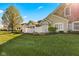 A charming exterior view showcases manicured landscaping and well-maintained lawn at 1098 Extraordinary Trl, Greenfield, IN 46140