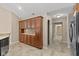 Kitchen featuring wooden cabinets with glass fronts and adjacent walk-in pantry at 1098 Extraordinary Trl, Greenfield, IN 46140
