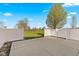 The fenced patio offers a private outdoor space with a view of the surrounding landscape at 1098 Extraordinary Trl, Greenfield, IN 46140