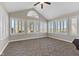 Bright sunroom with lots of windows and vaulted ceiling at 1098 Extraordinary Trl, Greenfield, IN 46140