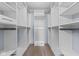 Spacious walk-in closet with custom shelving and ample storage space at 1098 Extraordinary Trl, Greenfield, IN 46140