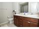 Bathroom with a double vanity, a large mirror, and plenty of storage space, perfect for busy mornings at 1175 Bent Tree Way, Plainfield, IN 46168