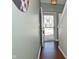Light-filled entryway features hardwood floors and a staircase leading to the upper level at 1175 Bent Tree Way, Plainfield, IN 46168