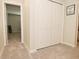 Hallway view with closet space and neutral carpet at 1175 Bent Tree Way, Plainfield, IN 46168