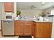 Kitchen area showcasing modern appliances, granite countertops, and stylish cabinetry at 1175 Bent Tree Way, Plainfield, IN 46168