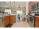 Open concept kitchen flows to dining area, modern appliances and plenty of counterspace for cooking at 1175 Bent Tree Way, Plainfield, IN 46168
