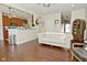Hardwood floors throughout the living and kitchen area create an inviting, open-concept living space at 1175 Bent Tree Way, Plainfield, IN 46168