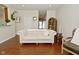 Inviting living room with hardwood floors offering a seamless transition to other living areas at 1175 Bent Tree Way, Plainfield, IN 46168
