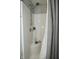 Clean, bright shower stall with mounted shower head and built-in shelf at 1175 Bent Tree Way, Plainfield, IN 46168