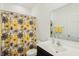 Bathroom featuring a floral curtain, vanity with a sink and a framed mirror at 122 Winding Brook Way, Pendleton, IN 46064