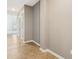 Hallway with light wood floors leading to bedrooms, living room, or kitchen at 122 Winding Brook Way, Pendleton, IN 46064