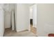 Walk-in closet featuring carpeted floor, wire shelving and access to the bathroom at 122 Winding Brook Way, Pendleton, IN 46064