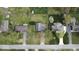 Aerial shot of homes with green lawns and mature trees, offering a serene neighborhood view at 1221 S Catherwood Ave, Indianapolis, IN 46203