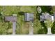 Aerial view showcasing the layout of homes with well-maintained lawns and surrounding trees at 1221 S Catherwood Ave, Indianapolis, IN 46203