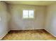 Empty bedroom with a window for natural light at 1221 S Catherwood Ave, Indianapolis, IN 46203