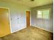 Spacious bedroom with a view through the window at 1221 S Catherwood Ave, Indianapolis, IN 46203