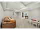Finished basement with a seating area, table, and pool table area at 12372 Ostara Ct, Fishers, IN 46037