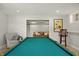 Finished basement featuring a pool table, a seating area, and ample lighting at 12372 Ostara Ct, Fishers, IN 46037