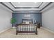 Comfortable bedroom featuring a decorative ceiling, calm color palette, and a cozy bed at 12372 Ostara Ct, Fishers, IN 46037