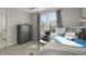 Comfortable bedroom featuring natural light, modern decor, and a stylish interior design at 12372 Ostara Ct, Fishers, IN 46037