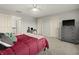 Bedroom featuring soft carpet, neutral colors, and ample closet space at 12372 Ostara Ct, Fishers, IN 46037