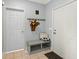 Charming entryway with storage bench, coat rack, and neutral paint at 12372 Ostara Ct, Fishers, IN 46037