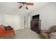 Living room featuring neutral tones, plush carpeting, and natural light at 12372 Ostara Ct, Fishers, IN 46037
