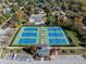 Overhead image of Heather Pointe's well-maintained tennis courts surrounded by neighborhood homes at 12372 Ostara Ct, Fishers, IN 46037