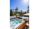 Relaxing hot tub area with nearby seating, perfect for outdoor entertainment next to the swimming pool at 12715 Norfolk Ln, Carmel, IN 46032