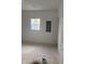 Unfinished bedroom featuring white walls and a window at 1309 W Memorial Dr, Muncie, IN 47302