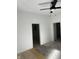 Bedroom featuring a ceiling fan, base electrical, and fresh paint, creating a comfortable atmosphere at 1309 W Memorial Dr, Muncie, IN 47302