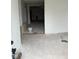 Unfinished living room area featuring raw flooring, and fresh paint at 1309 W Memorial Dr, Muncie, IN 47302