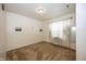 Minimalist bedroom with plush carpeting and a large window for ample natural light at 14014 Fieldcrest Dr, McCordsville, IN 46055