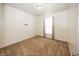 Simple bedroom with plush carpeting and a window that provides natural light at 14014 Fieldcrest Dr, McCordsville, IN 46055