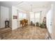 Bright dining area featuring tile flooring, large windows, and neutral walls at 14014 Fieldcrest Dr, McCordsville, IN 46055